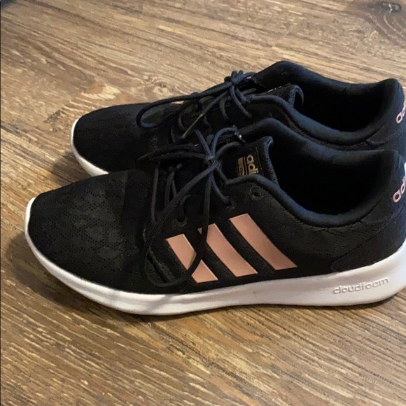 black adidas with rose gold stripes